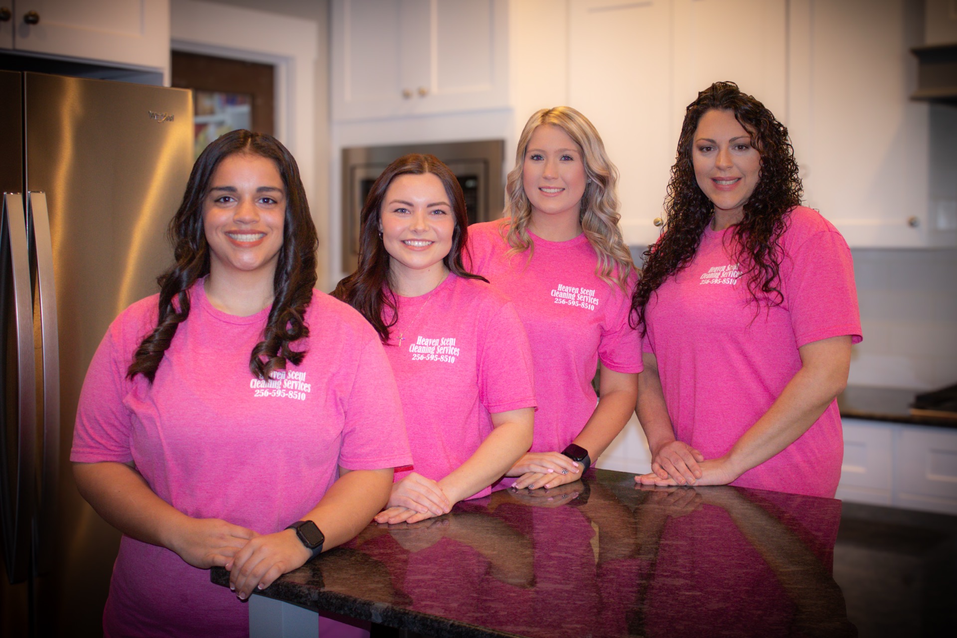 The Heaven Scent Cleaning Services team in branded shirts